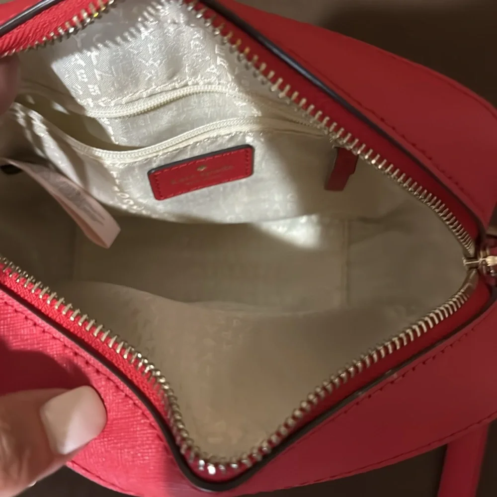 Kate Spade crossbody use only couple of tomes is in excellent condition.